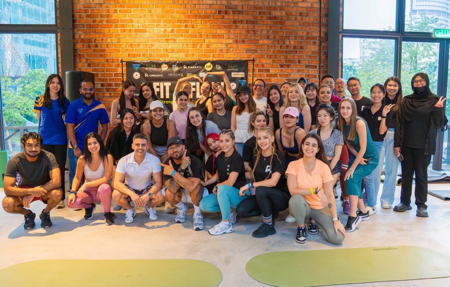 Public fitness session with a large community audience
