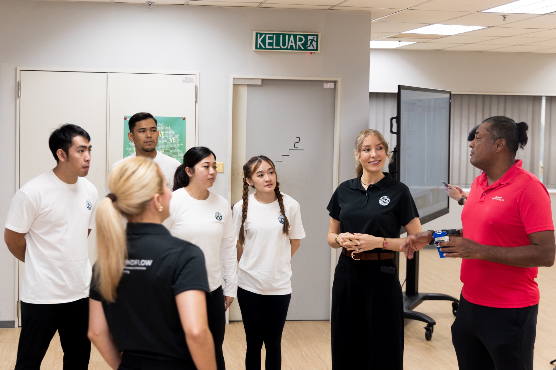 Tina Ka in a corporate wellness briefing